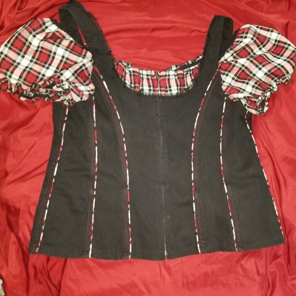 Corset like black w/ red plaid sleeves & details